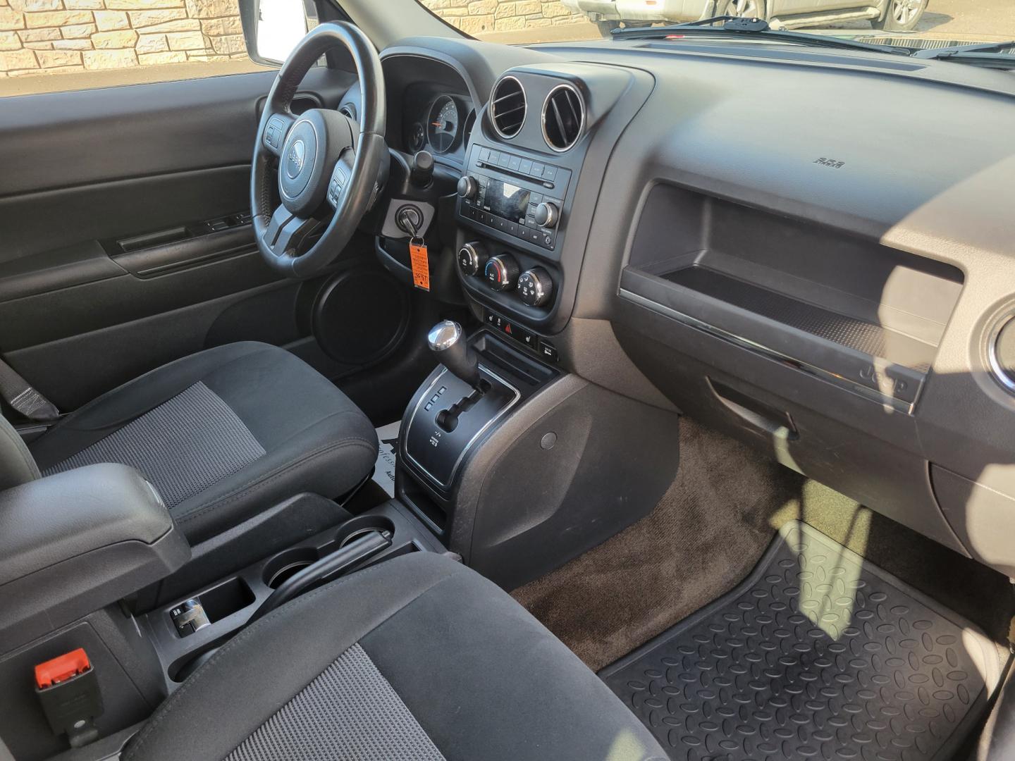 2014 Blue /Black Jeep Patriot Latittude (1C4NJRFB7ED) with an 2.4L I4 engine, 6 Speed Automatic transmission, located at 450 N Russell, Missoula, MT, 59801, (406) 543-6600, 46.874496, -114.017433 - Nice 4WD SUV. Heated Seats.6 Speed Automatic Transmission. 2.4L I4 Engine. Air. Cruise. Tilt. AM FM CD Satellite Radio. Firestone All-Season Tires. Power Windows and Locks. - Photo#8